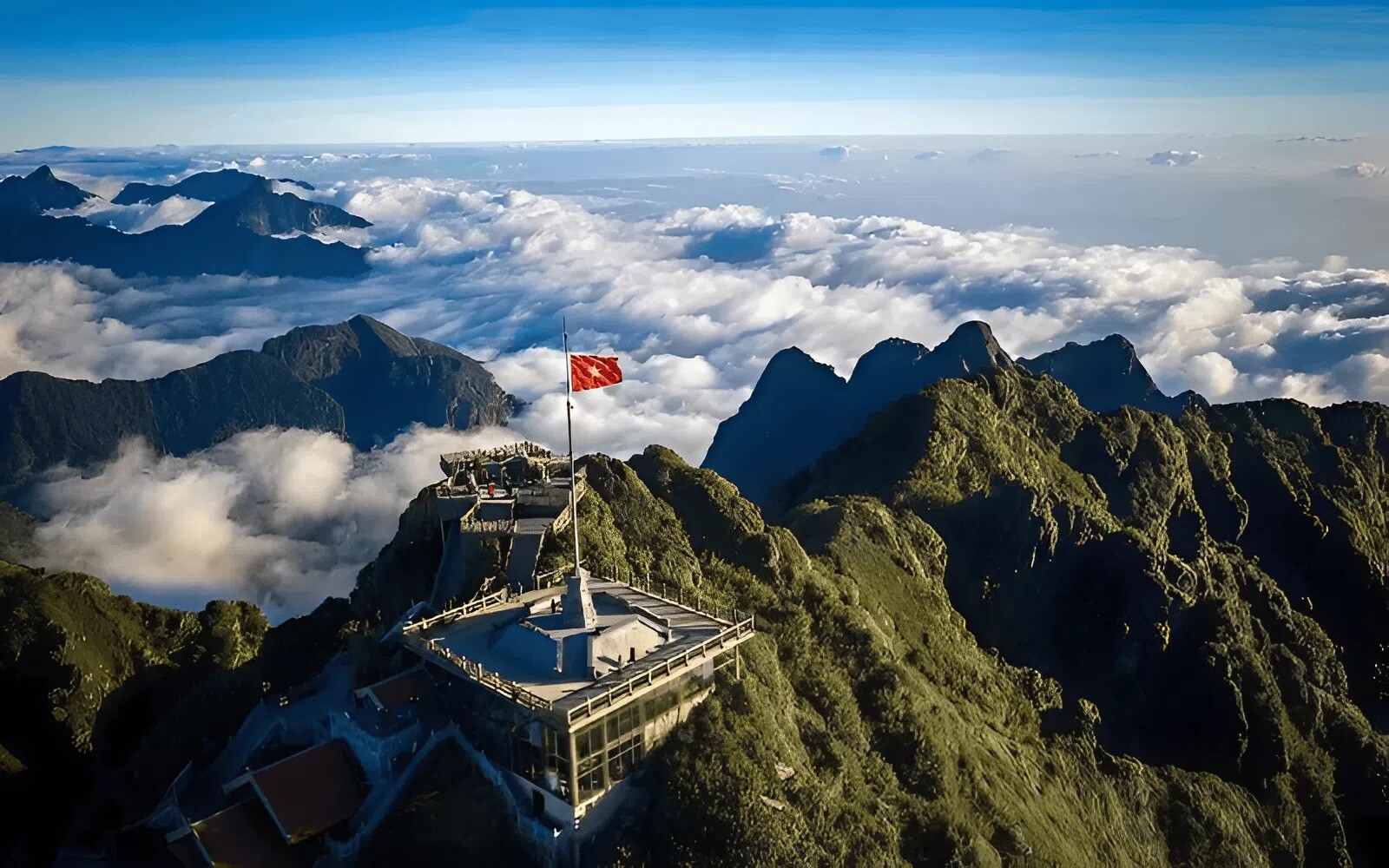 Sapa attractions: Top 10 Must-visit check-in spots 2 Standing On The Summit Of Fansipan, The Roof Of Indochina, Surrounded By Endless Clouds